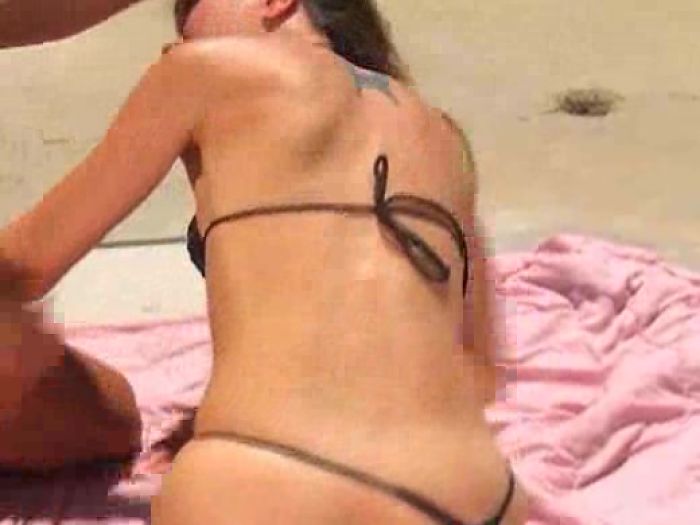 Nice brunette in a corset boned from behind