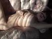 Yulia Nova posing nude on sofa