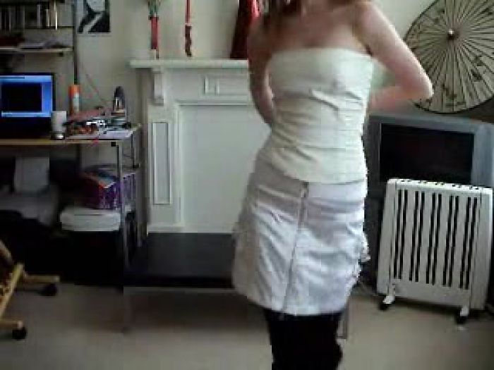 Red Head Strips To Her Sexy Tights